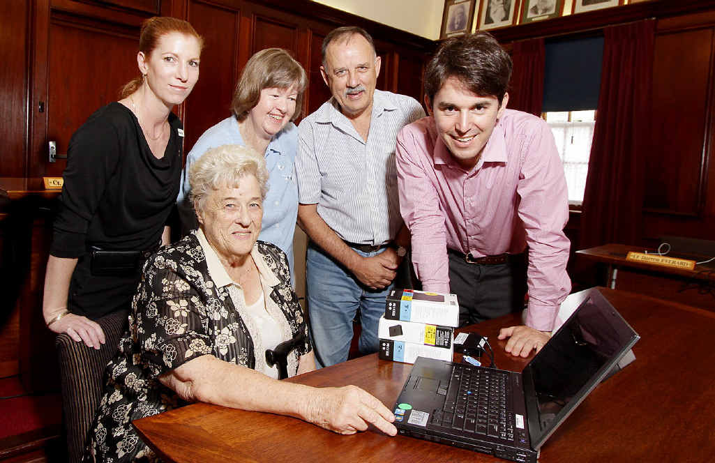 HISTORY: George Seymour (right) shows Kay Gassan (seated), Karla Chisholm, Jan Downman and Ian Scougall more than a century’s worth of files from hard drives presented to the local historians. HISTORY: George Seymour (right) shows Kay Gassan (seated), Karla Chisholm, Jan Downman and Ian Scougall more than a century’s worth of files from hard drives presented to the local historians.